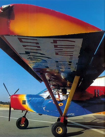 An ultralight aircraft with a pasted placecard is ready to take off, 2001