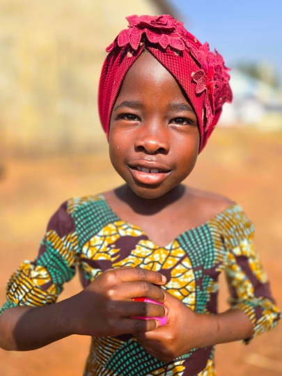 A happy Dagomba girl at Mbanaayili Village, Ghana 2026