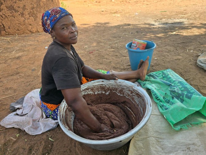 Traditional shea butter preparation by a Dagomba woman at Mbanaayili Village, Ghana 2026