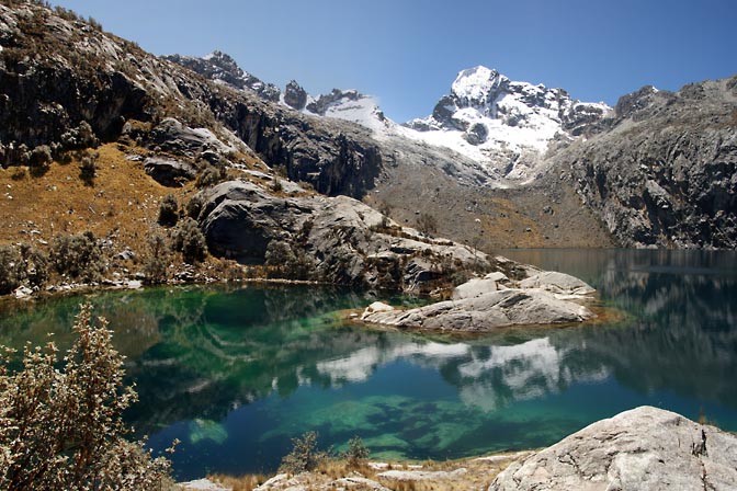 The reflection of Churup Mountain in the blue green rich color of Churup Lake, Cordillera Blanca 2008
