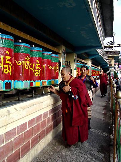 Tibetans rolling the prayer wheels at Temple road, McLeod Ganj, 2004