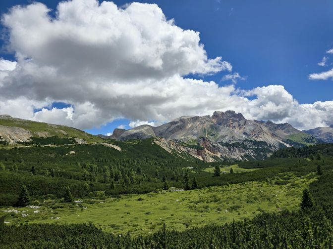A grassy basin backed by the impressive Dolomites, 2025