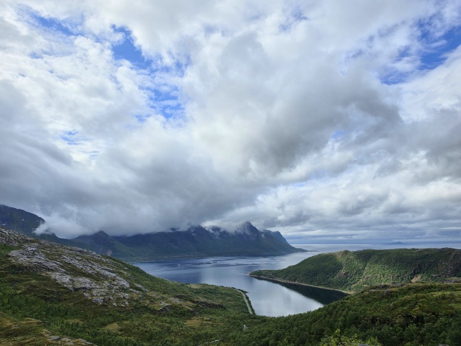 Sunbeams break through the clouds and illuminate the fjord, 2026